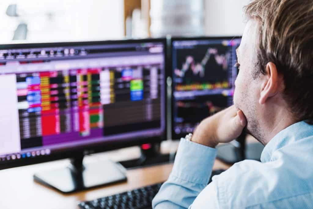 An employee looking a the monitor screen